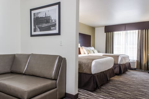 Studio, 2 Queen Beds with Sofa Bed, Non Smoking | Living area | Flat-screen TV