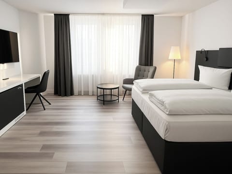 Comfort Double Room | Free minibar items, in-room safe, desk, iron/ironing board