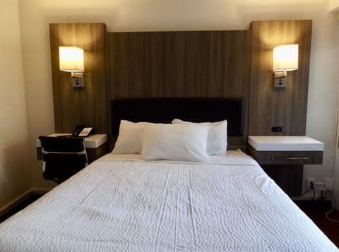 Individually decorated, desk, iron/ironing board, bed sheets