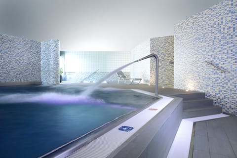 Sauna, hot tub, steam room, massage/treatment rooms