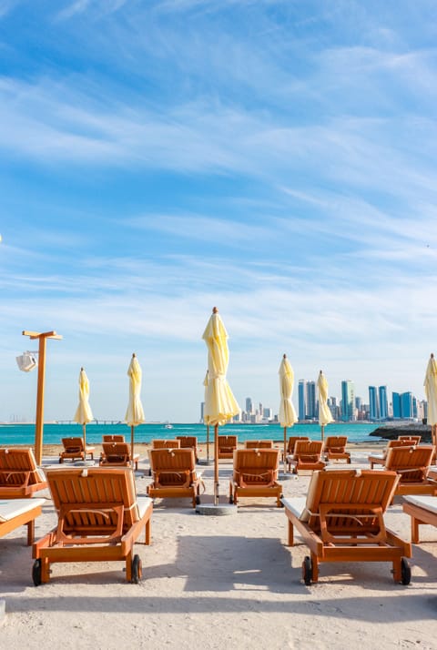 Private beach, sun loungers, beach bar