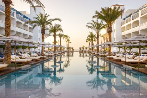Outdoor pool, cabanas (surcharge), pool umbrellas