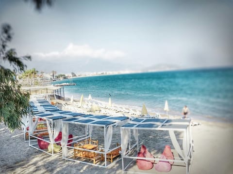 Private beach, sun loungers, beach umbrellas, beach towels