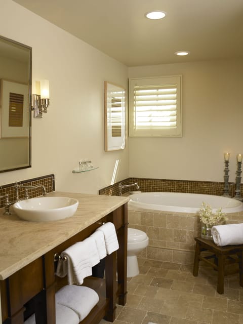 Shower, designer toiletries, hair dryer, bathrobes