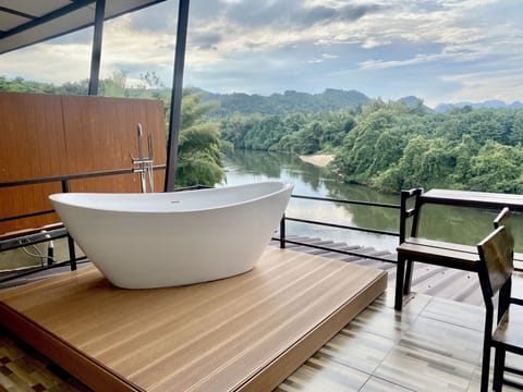 Deluxe Room, 1 King Bed, Non Smoking, River View | Balcony view