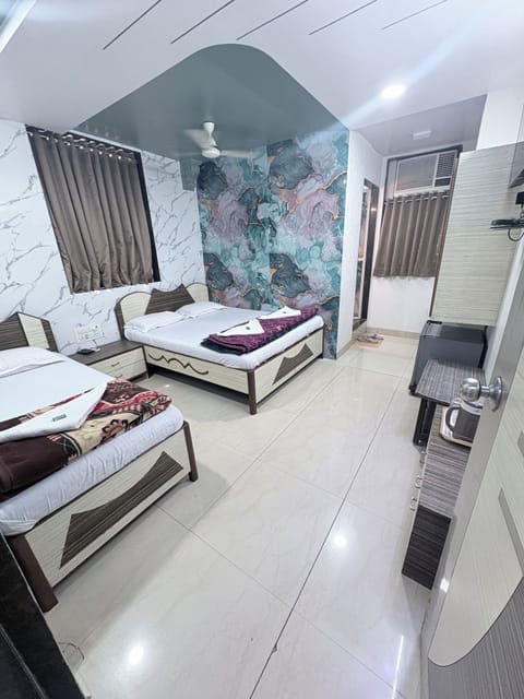 Triple Room | Iron/ironing board (on request), WiFi (free), bed sheets