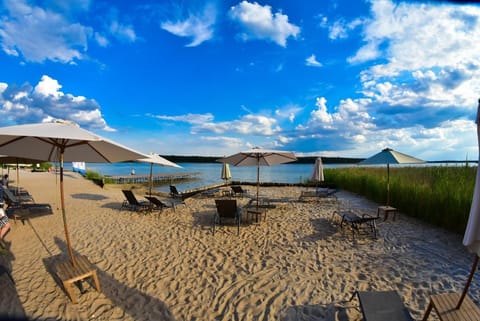 Private beach, sun loungers, beach umbrellas, beach volleyball
