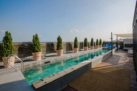 Seasonal outdoor pool, open 4:00 PM to 9:00 PM, cabanas (surcharge)