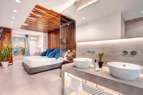 Junior Suite, 1 King Bed, Bathtub, Sea View | Premium bedding, down comforters, in-room safe, individually decorated