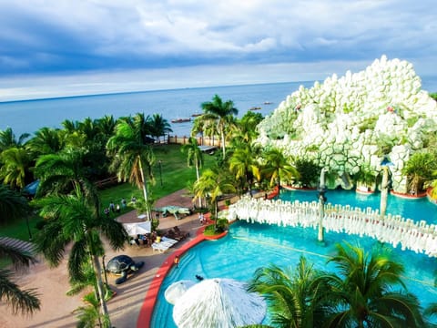Outdoor pool, open 6:00 AM to 10:00 PM, pool umbrellas