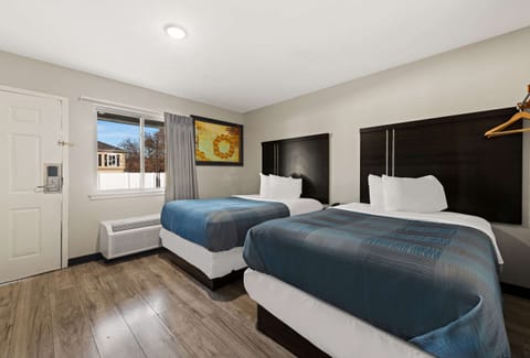 Standard Room, 2 Double Beds, Non Smoking | Select Comfort beds, individually furnished, desk, blackout drapes