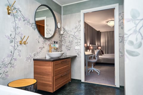 Junior Suite | Bathroom | Designer toiletries, hair dryer, towels, soap