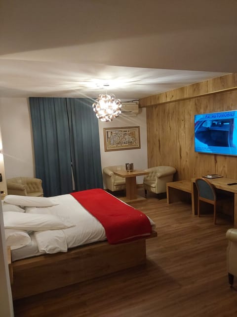 Premium bedding, down comforters, minibar, in-room safe