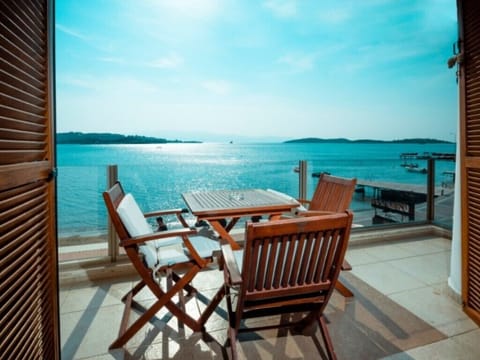 Exclusive Suite, 2 Bedrooms, Sea View, Beachfront | Balcony view