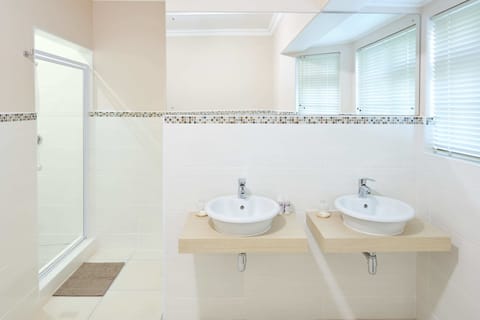 Luxury Suite, 1 Bedroom, Private Bathroom, Pool View | Bathroom | Hair dryer, towels