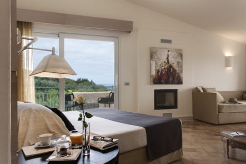 Deluxe Triple Room, Non Smoking, Sea View | Frette Italian sheets, premium bedding, down comforters, in-room safe