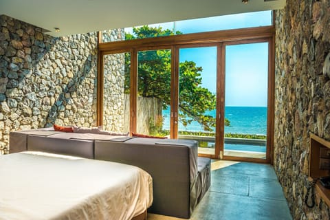 Royal Oceanfront Pool Villa | Minibar, in-room safe, blackout drapes, soundproofing