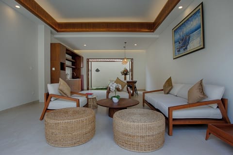 Balinese Modern Two Bedrooms Villas | Living area | 41-inch Smart TV with cable channels