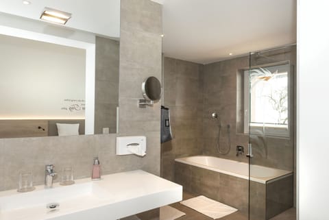 Shower, free toiletries, hair dryer, bathrobes