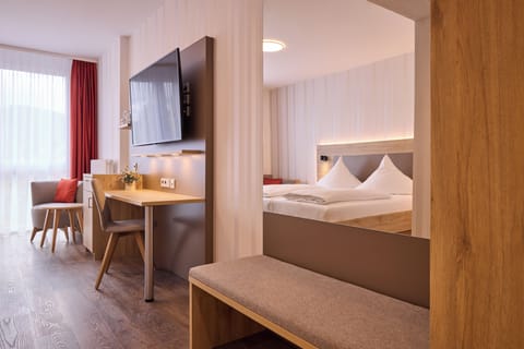 Deluxe Double Room | Minibar, in-room safe, desk, laptop workspace