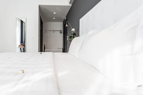 Down comforters, minibar, in-room safe, desk