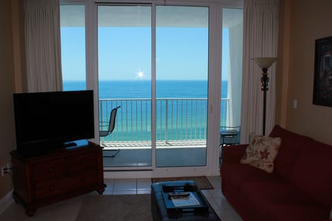 Condo, 2 Bedrooms, Balcony, Beachfront | Living area | Flat-screen TV, DVD player