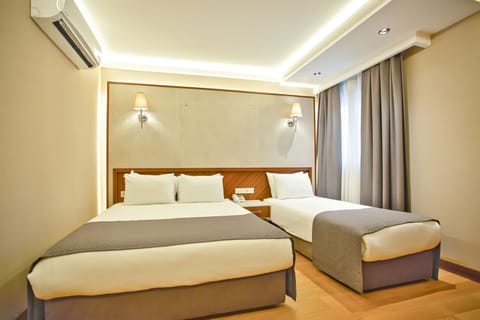 Egyptian cotton sheets, premium bedding, minibar, in-room safe