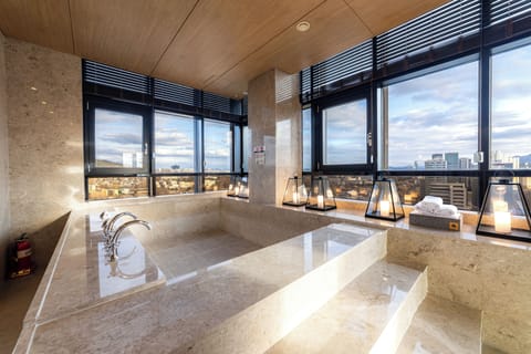 Designers Suite B (Premier Pool Namsan View Suite) | Bathroom | Combined shower/tub, deep soaking tub, hair dryer, bathrobes