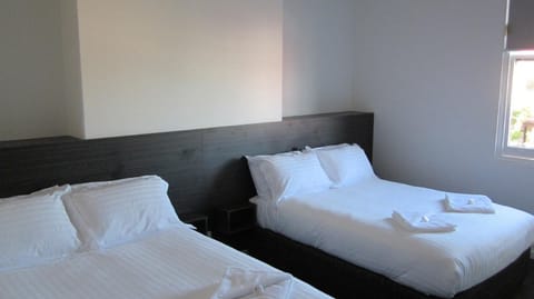 Two Double Beds Twin Room | Iron/ironing board, free WiFi, bed sheets