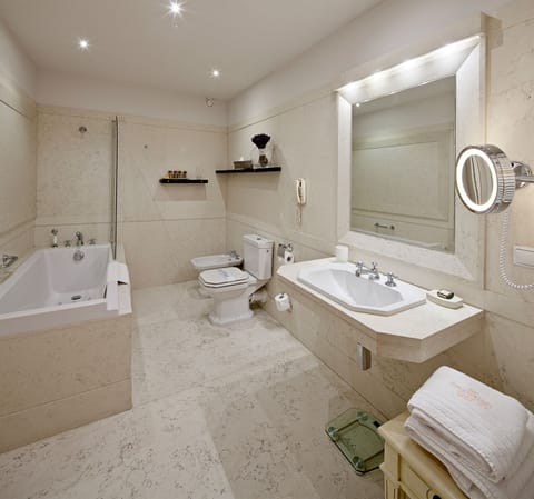 Luxury Apartment, City View | Bathroom | Combined shower/tub, designer toiletries, hair dryer, bathrobes