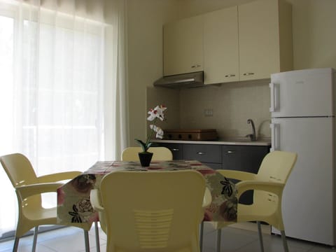 Apartment, 1 Bedroom, Balcony, Garden View | Living area | TV