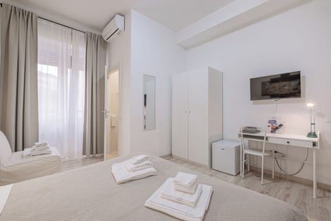 Quadruple Room | Premium bedding, free minibar, in-room safe, desk