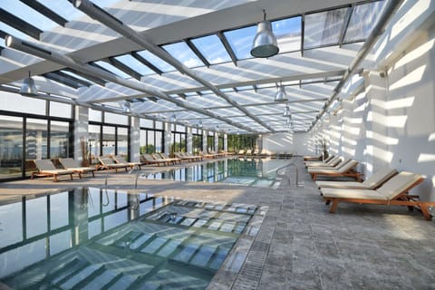 Indoor pool, outdoor pool, open 9:00 AM to 6:00 PM, pool umbrellas