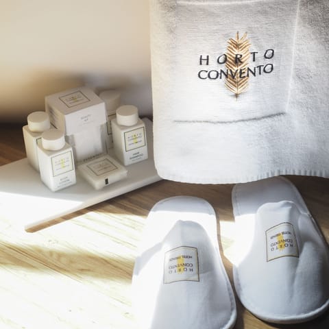 Shower, free toiletries, hair dryer, slippers