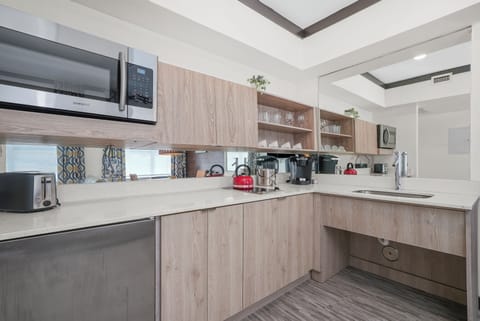 Accessible Deluxe One Bedroom Queen Suite | Private kitchen | Fridge, microwave, oven, stovetop