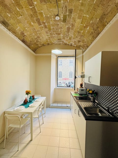 Two-Bedroom Apartment | Private kitchen | Fridge, electric kettle