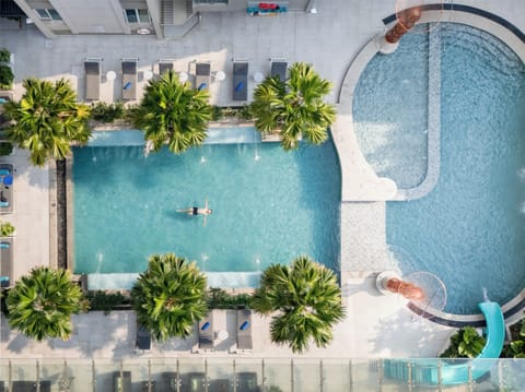 Outdoor pool, open 7:00 AM to 8:00 PM, pool umbrellas, sun loungers