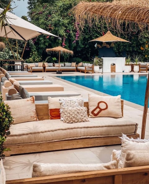 Outdoor pool, pool umbrellas, sun loungers
