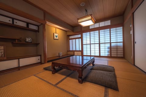 Deluxe Japanese Style Suite with Jetted Bathtub and Kitchen, 2 Bedrooms | Down comforters, blackout drapes, iron/ironing board, free WiFi