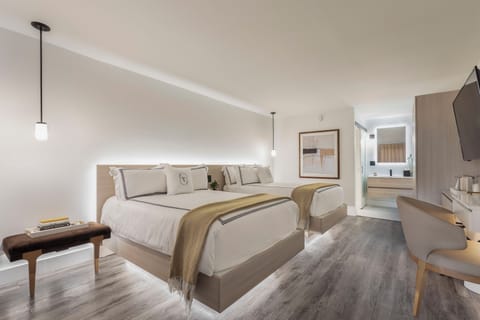 Standard Double Room, 2 Double Beds | Minibar, in-room safe, individually decorated, individually furnished