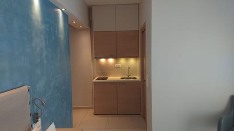 Mini-fridge, stovetop, coffee/tea maker, electric kettle