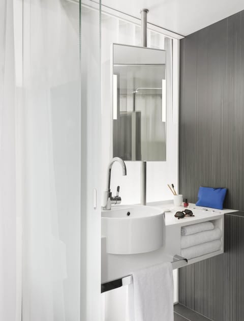 Shower, rainfall showerhead, eco-friendly toiletries, hair dryer