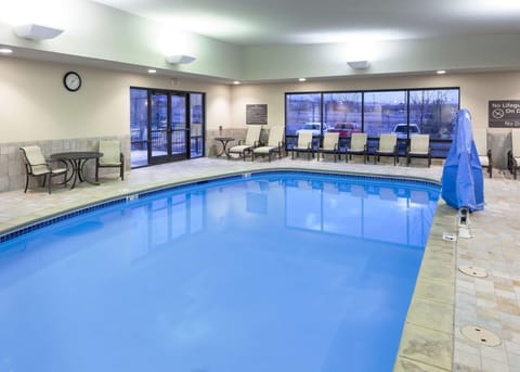 Indoor pool, open 6 AM to midnight, sun loungers