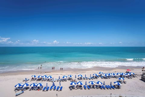 On the beach, beach cabanas, sun loungers, beach towels