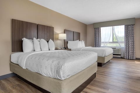 Suite, 2 Queen Beds, Non Smoking, Microwave | In-room safe, desk, iron/ironing board, cribs (free)