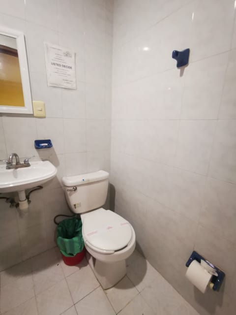 Quadruple Room, 2 Double Beds | Bathroom | Shower, free toiletries, towels
