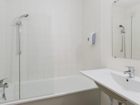 Desk, blackout drapes, soundproofing, free WiFi