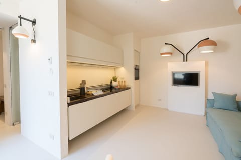 Superior Suite, Ground Floor | Premium bedding, minibar, in-room safe, individually decorated