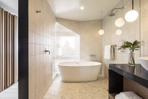 Premium Room, 1 King Bed (Spa) | Bathroom | Designer toiletries, hair dryer, bathrobes, slippers