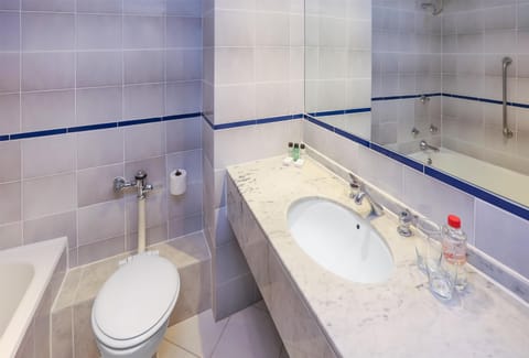 Double Room with Two Double Beds | Bathroom | Separate tub and shower, designer toiletries, hair dryer, towels